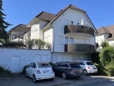 Sonnendurchflutete 2,5-Zimmerwohnung mit Balkon, Terrasse und Tiefgaragenstellplatz
