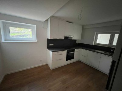 Kernsanierte 53 m² Souterrain-Wohnung (Erstbezug) mit EBK & Fußbodenheizung in Top-Lage, S-Vaihingen