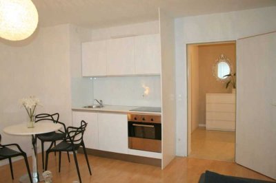 Geschmackvolle, modernisierte 1,5-Zimmer-Wohnung mit geh. Innenausstattung mit Balkon und EBK