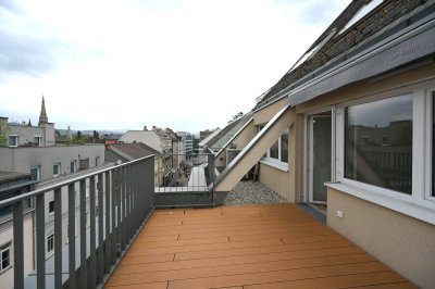 Exklusive Innenstadtwohnung mit Dachterrasse &amp; Klimaanlage – Blick über die Dächer von Linz