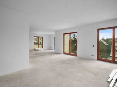 Familienglück im Erstbezug: Moderne 4-Zimmer-Wohnung mit großzügigem Garten und optimaler Anbindung