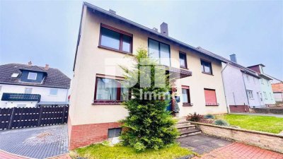 Gepflegtes Ein- bis Zweifamilienhaus + Garage, Terrasse und Balkon auf großem Grundstück