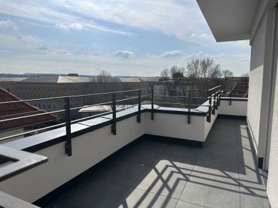 Über den Dächern der Stadt - exklusive Neubauwohnung mit Dachterrasse und zwei Stellplätzen