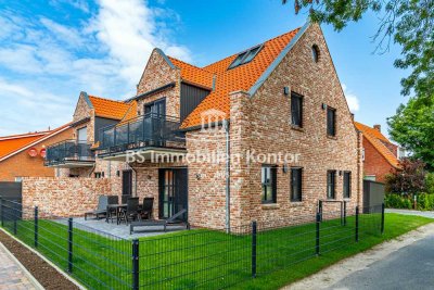 Greetsiel-Top Lage! Neuwertige, möblierte OG-Wohnung mit Balkon, Gartenanlage und PKW-Stellplatz!