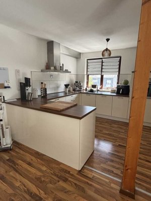 Charmante Etagenwohnung mit Dachterrasse in ruhiger Lage