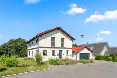 Wohnen mit Weitblick! Stilvolles Einfamilienhaus mit Blick ins Grüne