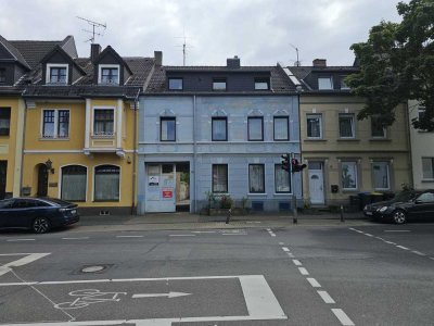 Miethaus 3 Wohneinheiten, 1 Lagerhalle im Zentrum von Frechen