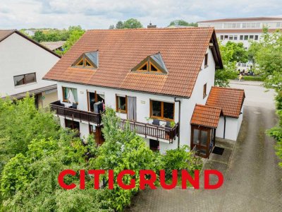Unterschleißheim - Gepflegtes Familiendomizil mit drei Wohneinheiten und sonnigem Garten