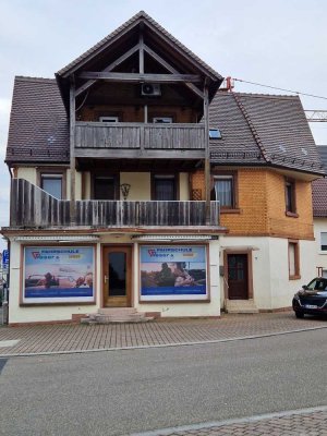 Wohngebäude mit Gewerbefläche in zentraler Lage