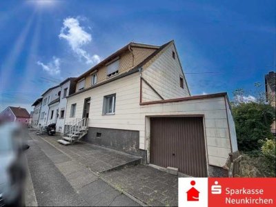 Ideal für Familien - Einfamilienhaus mit Garage und schönem Grundstück