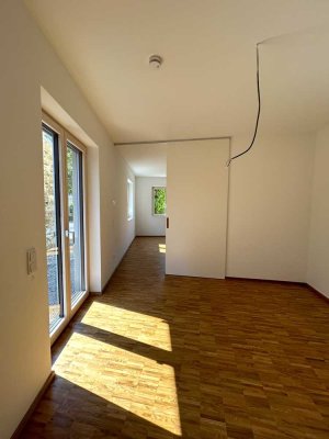Erstbezug: Hochwertige 4 Zimmer EG Wohnung mit Terrasse im Zentrum