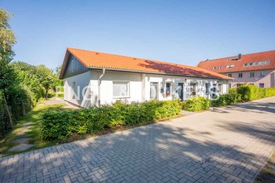 Investieren in Lage, Komfort und Struktur – Dreiparteien-Bungalow in Wassernähe