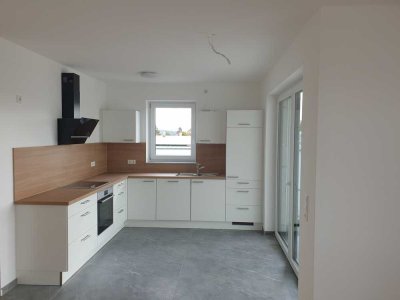 Tolle Neubau Wohnung mit Terrasse und Garten