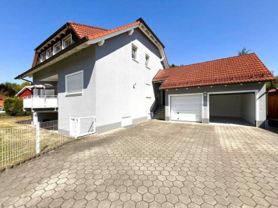 Viel Platz für Familie und Kapitalanleger: 9-Zimmer-Haus mit Garten