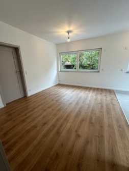 ! Neubau - EG Wohnung mit großer Terrasse und Gartenanteil !