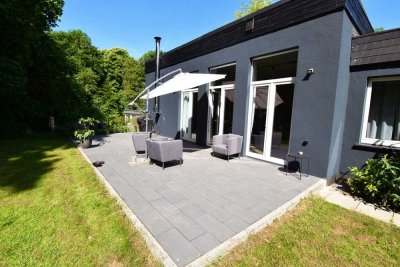 Haus im Haus - Bungalow-Wohnung mit Loftcharakter