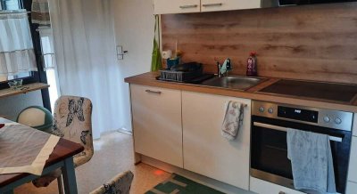 Schöne 2-Zimmer-Wohnung mit Holzofen und großer Terrasse