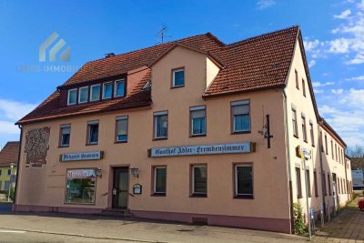 Objekt für Investoren - Mehrfamilienhaus mit Gewerbeeinheit und Baugrundstück zum Kauf