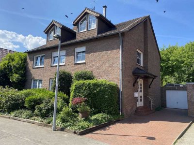 Gepflegtes Dreifamilienhaus mit Wintergarten und Garage in ruhiger Wohnlage!