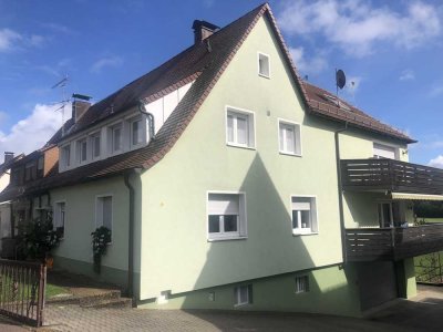 ruhige Drei-Zimmerwohnung mit Balkon und Gartenanteil