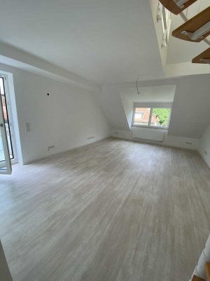 Zentral Wohnen im Grünen - Helle 3-Zimmer-Maisonette mit Balkon // Erstbezug