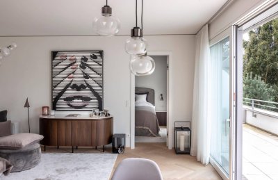 RIEDENBURG | Perfektes City-Apartment mit 22 m² Sonnenterrasse und exklusiver Innenausstattung