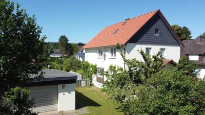 Wunderbar gelegenes Einfamilienhaus mit Bauland!