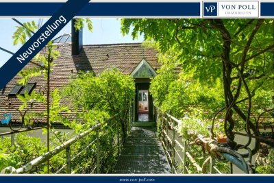 Einzigartige Villa-Dachgeschosswohnung in Ebenhausen – Stilvoll wohnen seit 1916