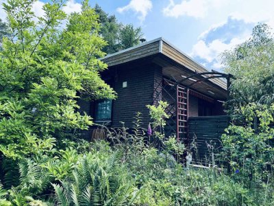 Viel Potenzial: Renovierungsbedürftiger Bungalow mit Wärmepumpe und PV-Anlage in ruhiger Lage