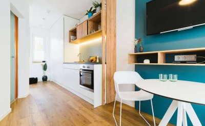Smartes Wohnen - Möblierte Erdgeschosseinheit mit Terrasse, Garten und TG-Stellplatz