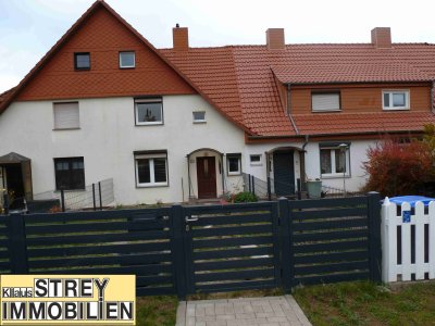 Reihenmittelhaus mit drei Garagen und attraktiven Grundstück in gefragter Lage