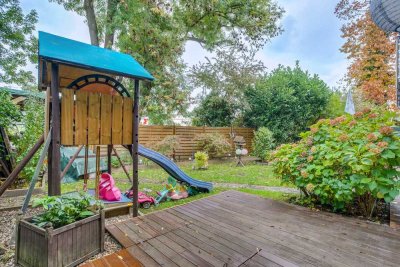 Helle 3-Zimmer-Souterrainwohnung mit weitläufigem Garten - Ihr grünes Rückzugsparadies