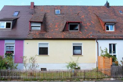 Reihenmittelhaus mit zwei Wohnungen und Garten in ruhigem Wohngebiet