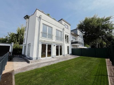 Exklusives Wohngefühl in urbaner Gartenwohnung im Haus-im-Haus-Stil!