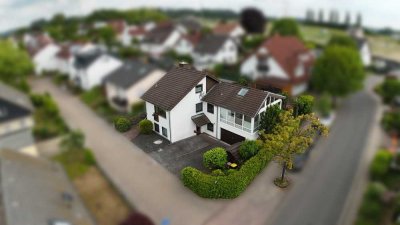 Freistehendes Einfamilienhaus mit Wintergarten, Kamin & Doppelgarage in Toplage von Neuhäusel