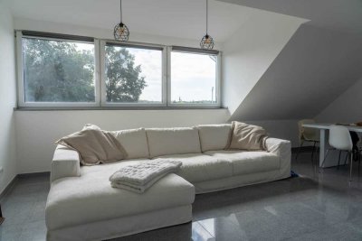 Attraktive und neuwertige 2-Zimmer-DG-Wohnung mit gehobener Innenausstattung in Loccum