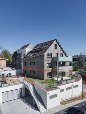 Stilvolle Neubau 3-Zimmer-Wohnung mit gehobener Innenausstattung und großen 135m2 Garten
