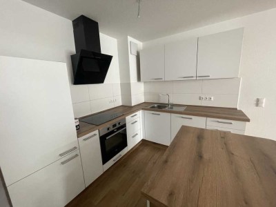 Helle 2-Zimmer-Wohnung in zentraler Lage mit TG-Stellplatz & Einbauküche