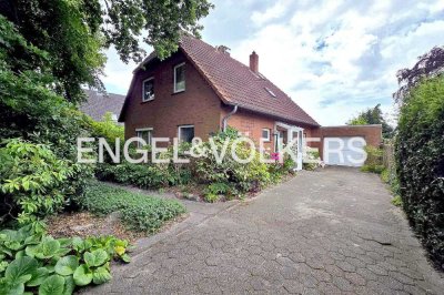 Solides Einfamilienhaus mit Wintergarten und Gartenidylle in Langewerth