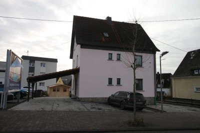 2 Zimmer Wohnung mit Kfz-Stellplatz und sep. Gartenhaus