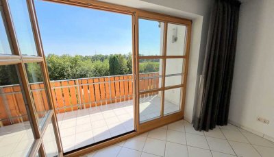 Attraktive 4 Zimmer Eigentumswohnung über zwei Etagen mit Süd-West-Balkon und großem Gartenanteil