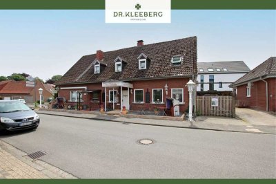 Vielseitiges Wohn- und Geschäftshaus mit Baugrundstück in zentraler Lage von Laer