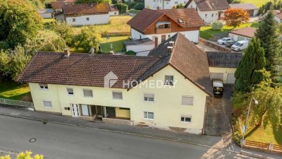 Großzügiges Mehrfamilienhaus mit drei Wohneinheiten + Gewerbe und idyllischem Garten