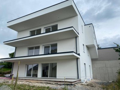 Wohlfühlen am Sonnenhang - Erstbezug in moderne Gartenwohnung! (optional auch mit drei Zimmer für mehr Komfort)