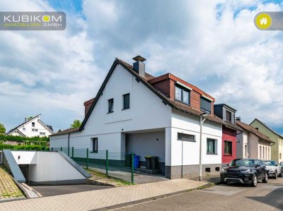 Modernisiertes Zuhause mit Weitblick – Stilvoll saniertes Einfamilienhaus mit großem Garten.