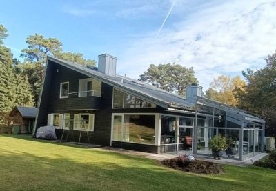 Exklusive Architektenvilla auf sonnigem Traumgrundstück in idyllischer Waldlage von Hausbruch