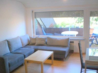 Charmante 2-Zimmer Dachgeschosswohnung mit EBK, Garage, Loggia ins Grüne, zentral und dennoch ruhig