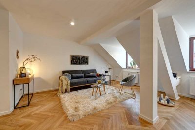Kleine, gemütliche Oase - elegante 2-Zimmer-Dachgeschosswohnung