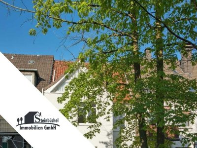 Vielseitiges Mehrfamilienhaus mit Ladeneinheit und zwei Garagen in beliebter Lage!
