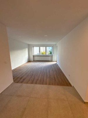 Sanierte 3-Zimmer Erdgeschosswohnung mit eigenem Gartenanteil